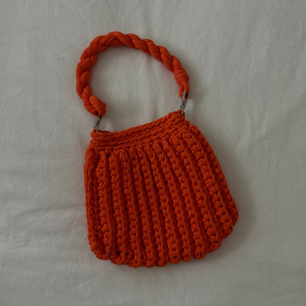 Handmade orange crochet purse with handle